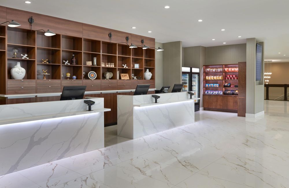 Reception desk and lobby at Four Points by Sheraton Toronto Airport